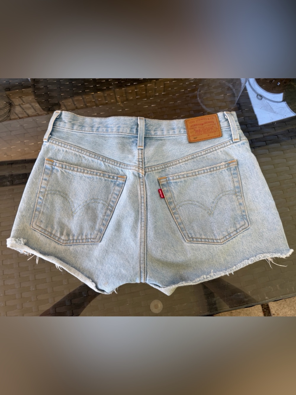 Levi's 501 Original High-Rise denim shorts - light wash with a frayed hem